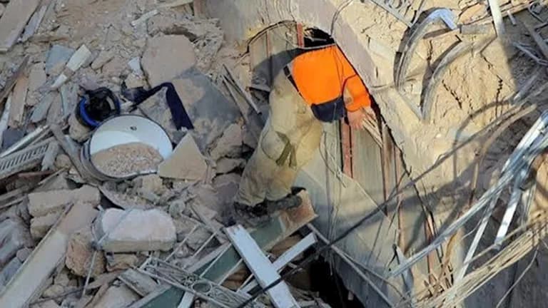 Building collapses after Israeli strikes in Beirut suburbs