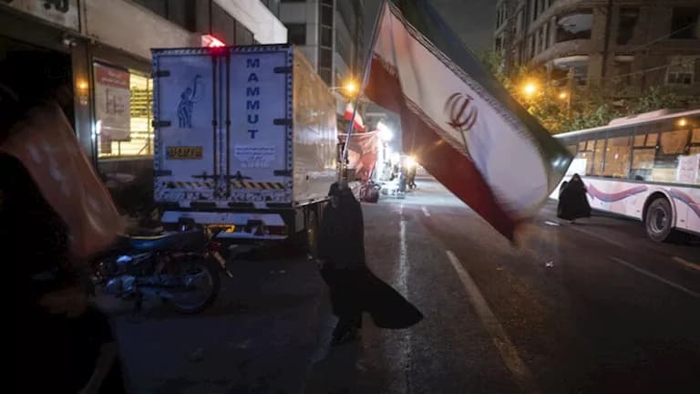 Iran reports city explosions and air defense activation
