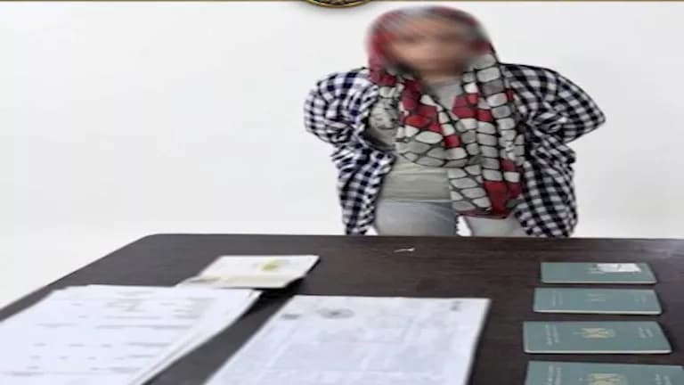 سيدة تستخدم عبارة الباسبور عليك للسفر لنا في عملية نصب