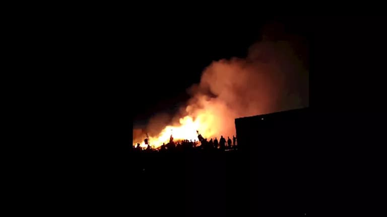 Fire containment efforts at Mawalih Factory