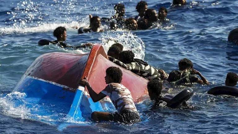 Tunisia migrant boat sinks with 2 bodies found