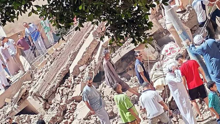 Minya building collapse search for victims