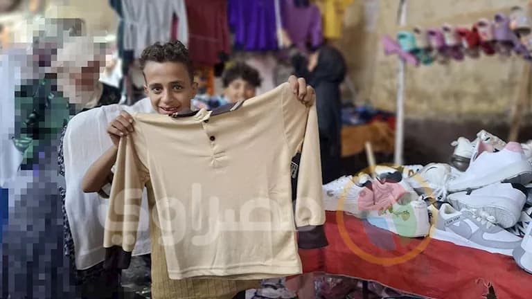 Assiut Market Walks for School Supplies