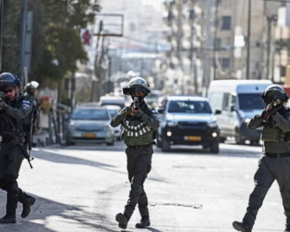 Occupation forces near Ram outskirts