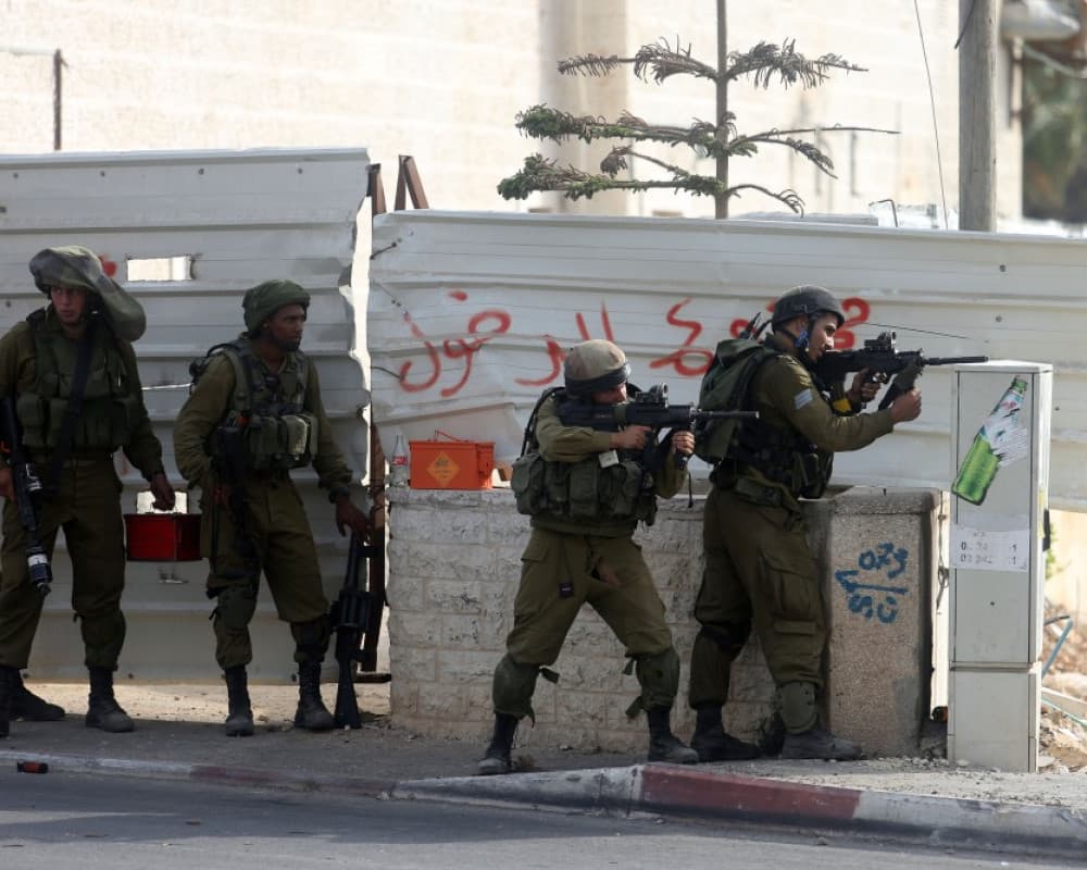 Young man wounded by gunfire in Al-Jalazon camp