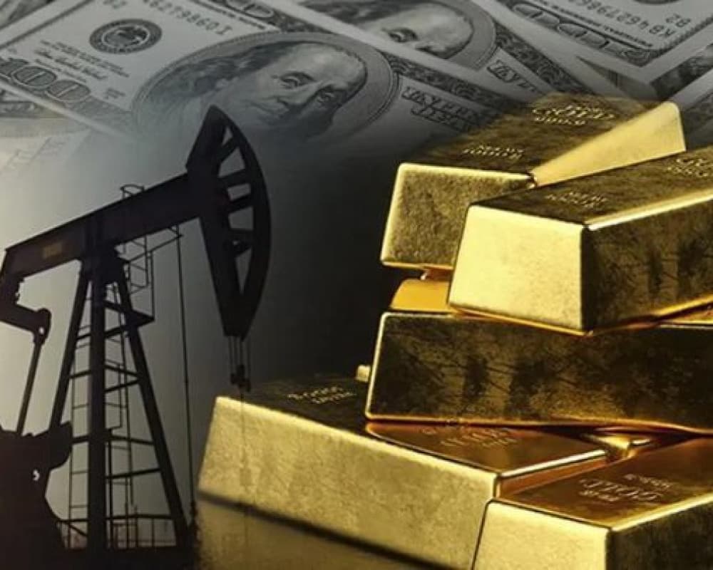 Gold drops as oil stays steady