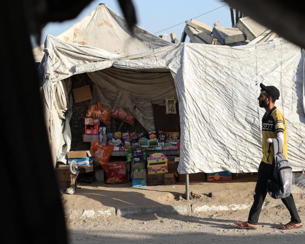 Limb amputee shaves inside tent in Nuseirat