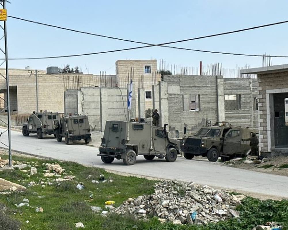 Occupation forces raid Kisan village leader's home