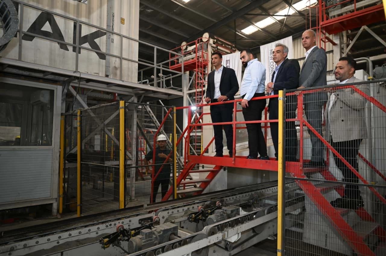 Industry Minister visits cement plant and opens ten schools