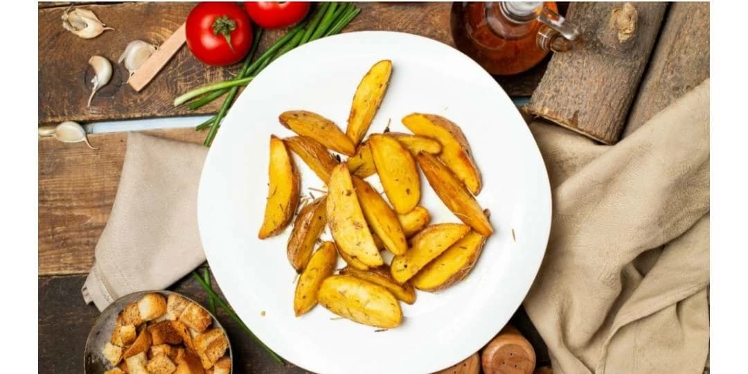Golden and spiced crispy baked potatoes