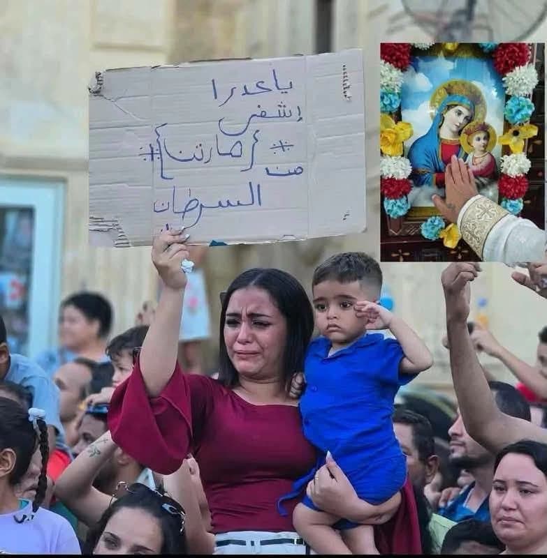 لافتة مؤثرة لأم تبكي زوار دير درنكة