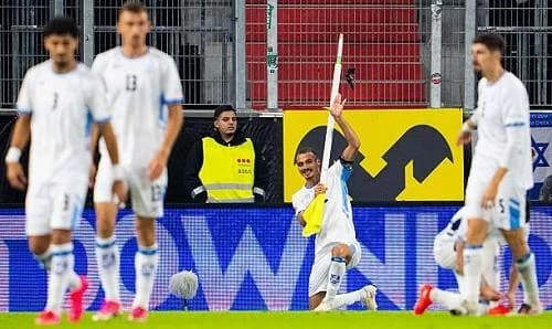 Israeli player prompts controversy over gun gesture