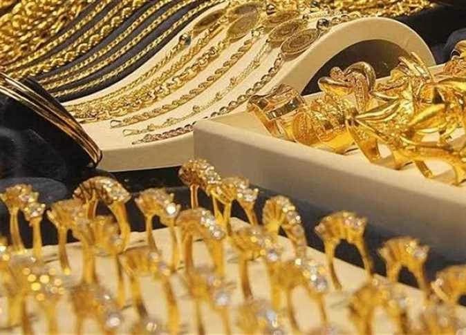 Gold reaches new 21-karat high