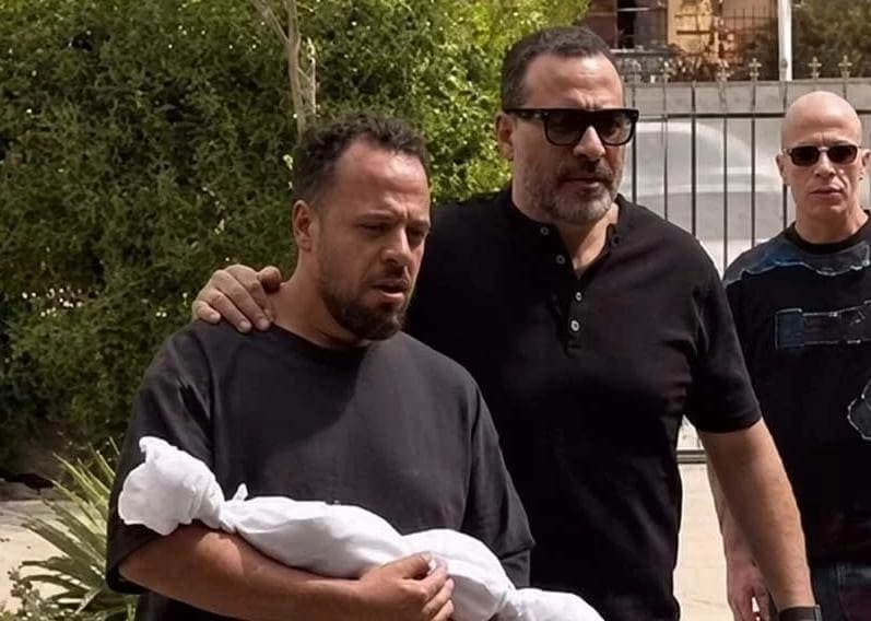 Ahmed Magdy faints at son's funeral