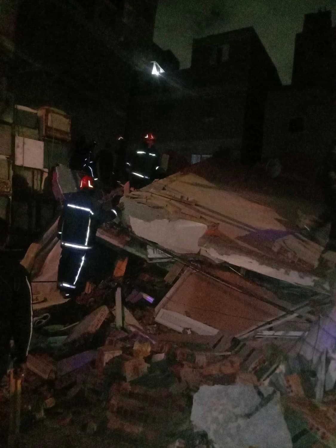Alexandria residential building collapse search for missing