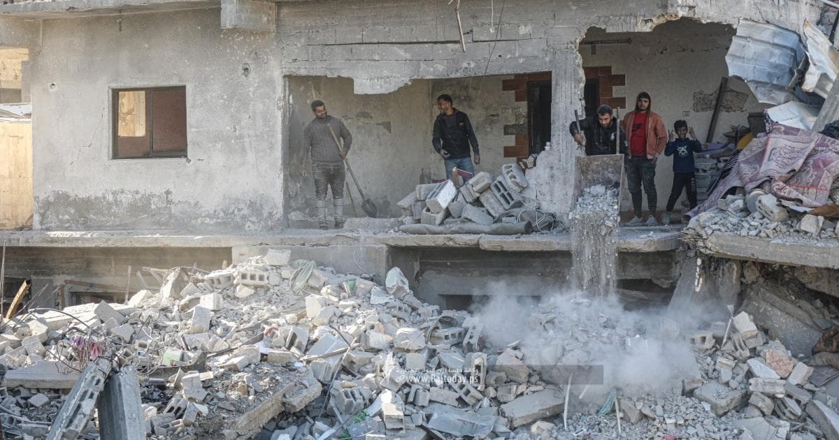 Child mourns brother in rubble