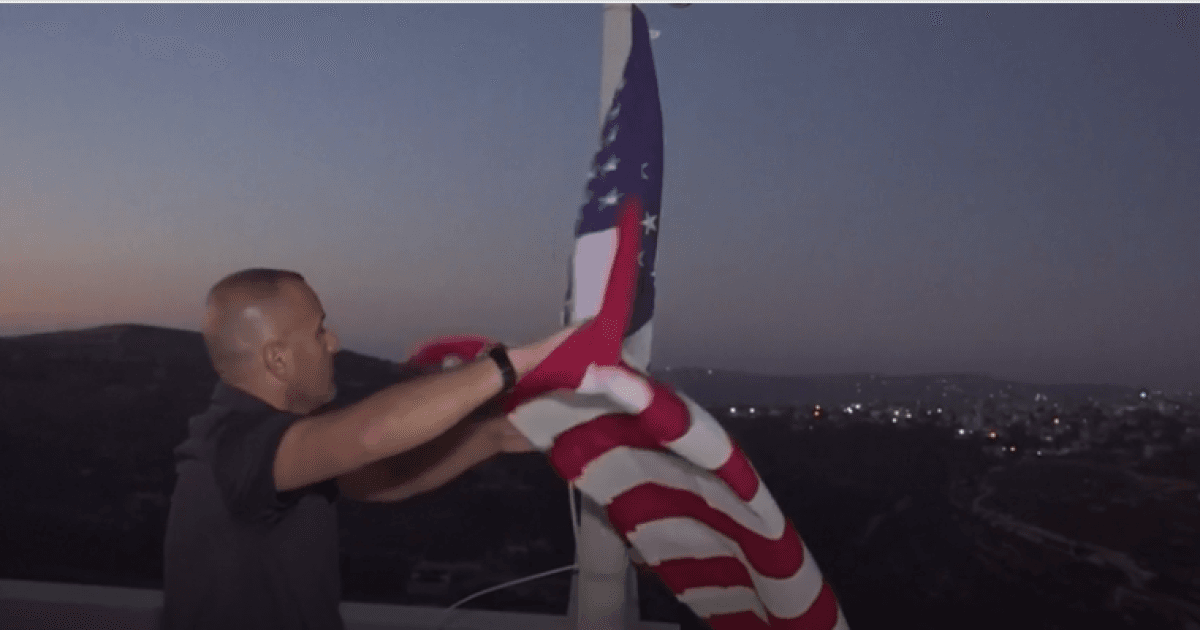 Palestinian defends home from settlers with US support