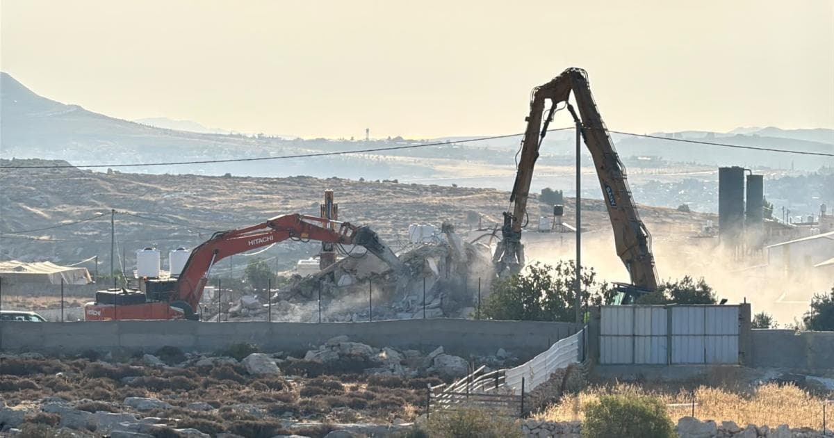 Occupation forces compel Ramallah resident to demolish home