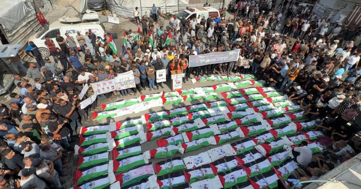 Funeral for 100 martyrs in Al-Zaytoun