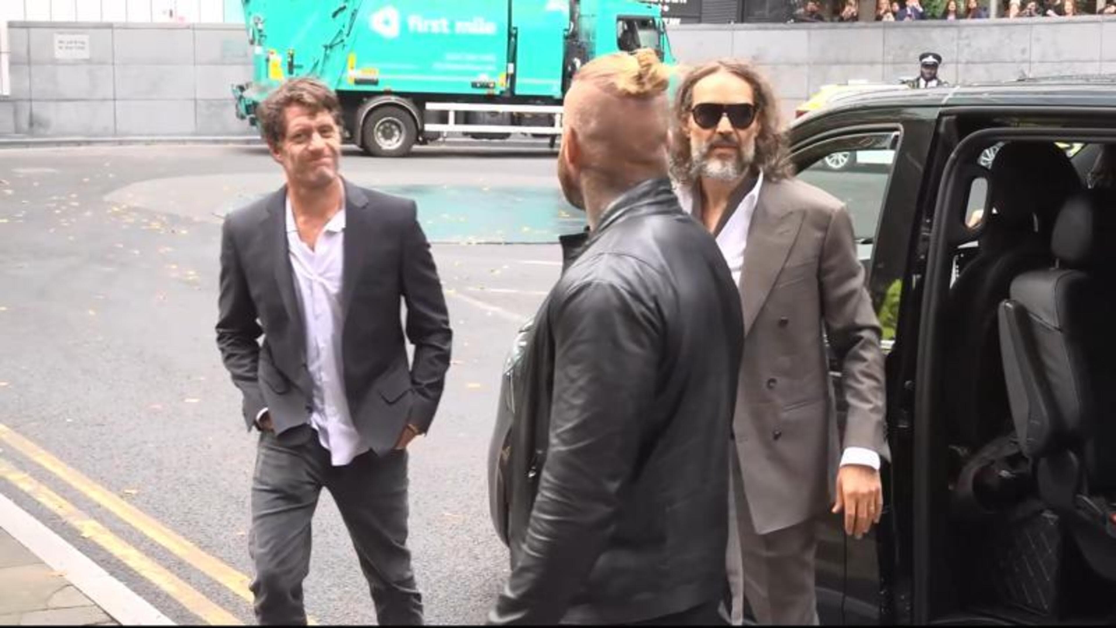 Russell Brand attends UK court for second day of rape trial