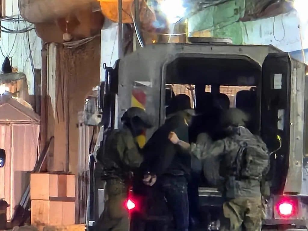 Occupation forces raid West Bank and detain Palestinians
