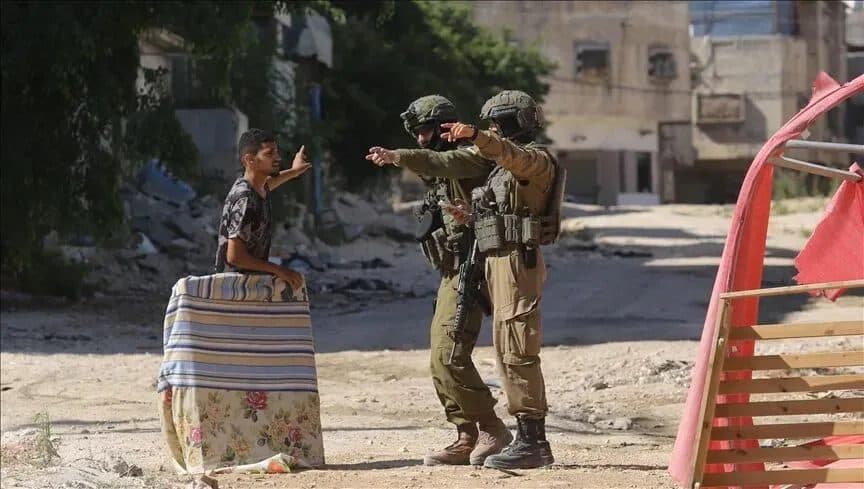 Families of martyrs and prisoners face raids