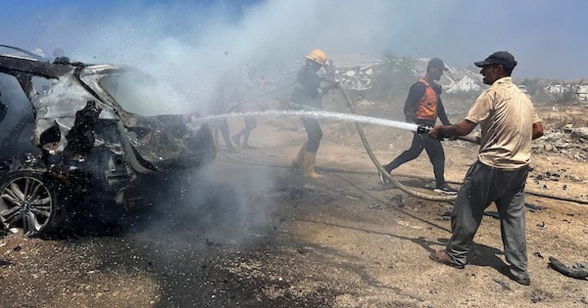 Palestinians at Gaza Raid Scene