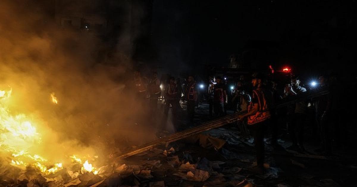 Palestinians examine Gaza building damage