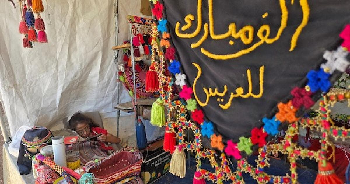 Refugee Shirin Nassar preps wedding supplies