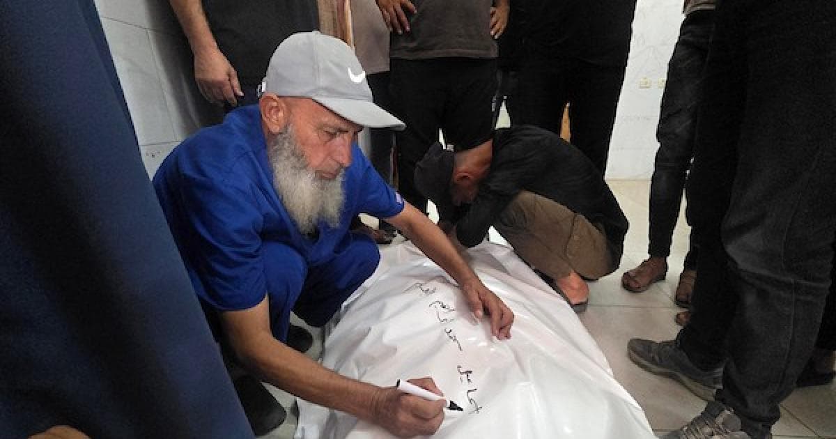 Palestinian medics transfer casualties after airstrike in Khan Younis