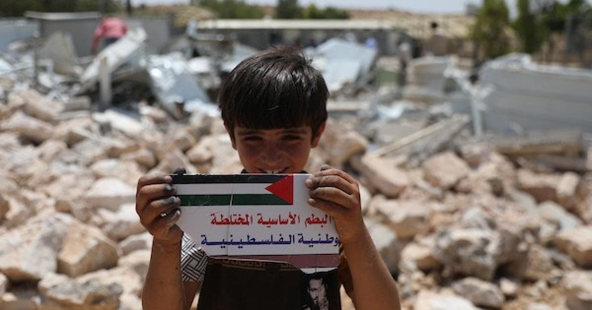 Palestinians Examine Damaged Sha'ab al-Batam School
