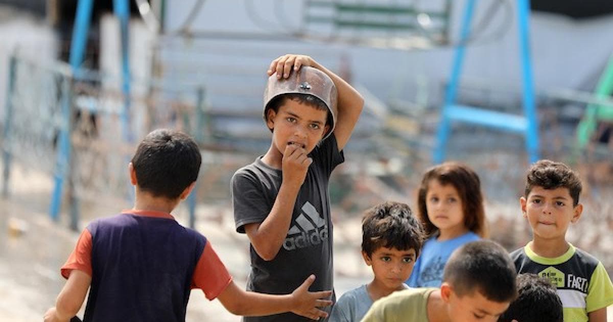 Daily life amid ruins east of Jabalia
