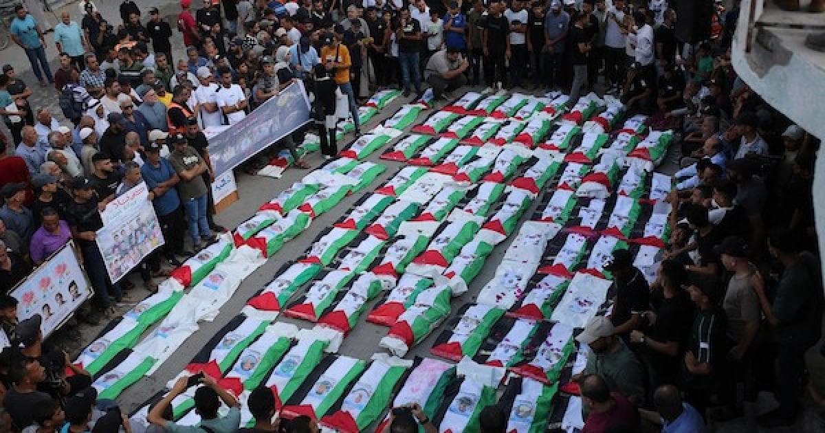 Palestinians carry loved ones during Gaza funeral