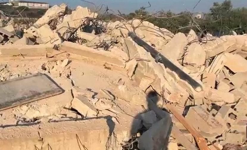 Occupation forces compel Jabal al-Mukabbir resident to demolish home
