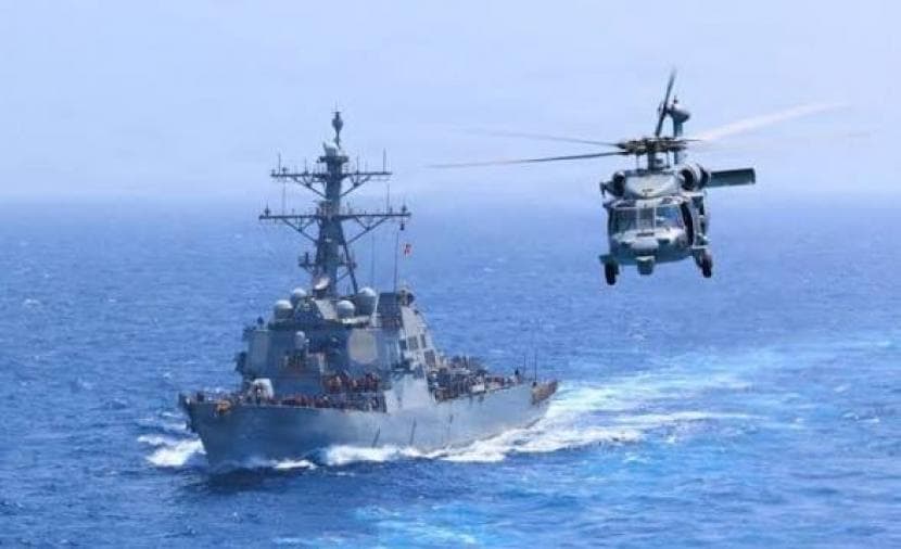 US and Iran exchange missile fire in Strait
