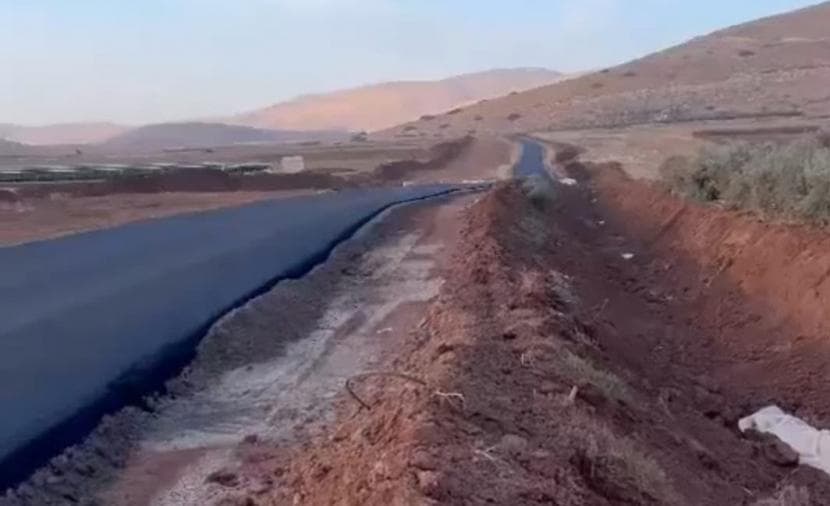 Occupation constructs military road east of Atouf