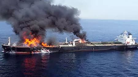 Oil tanker burned in Hormuz, Iran boosts military readiness