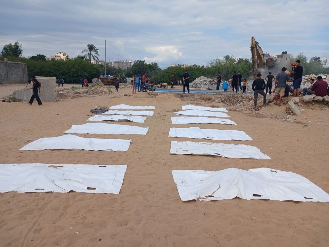 Gaza Bodies of 22 Palestinians Rescued