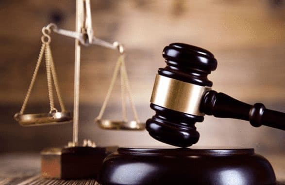 وزارة العدل تطلب تسليم الملاحقين غيابيا