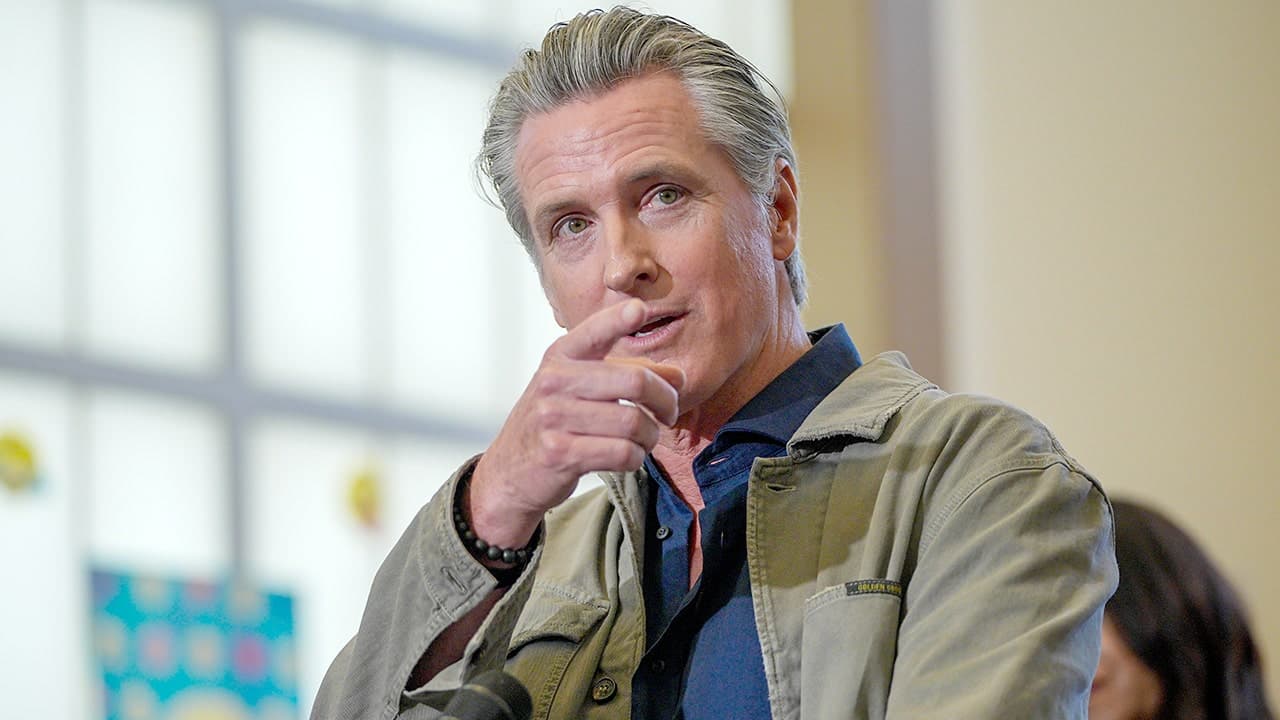 Newsom sidesteps SAT score revival query