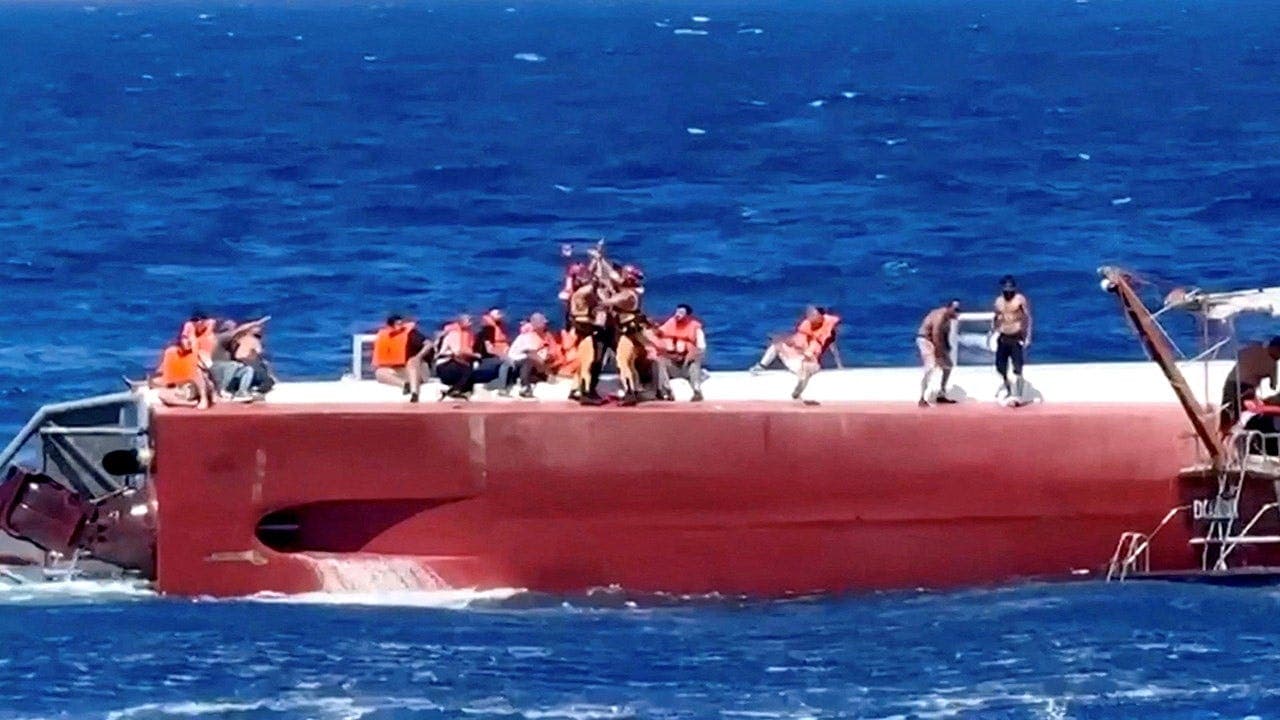 Mother's hold broken as ferry capsizes with 20 missing