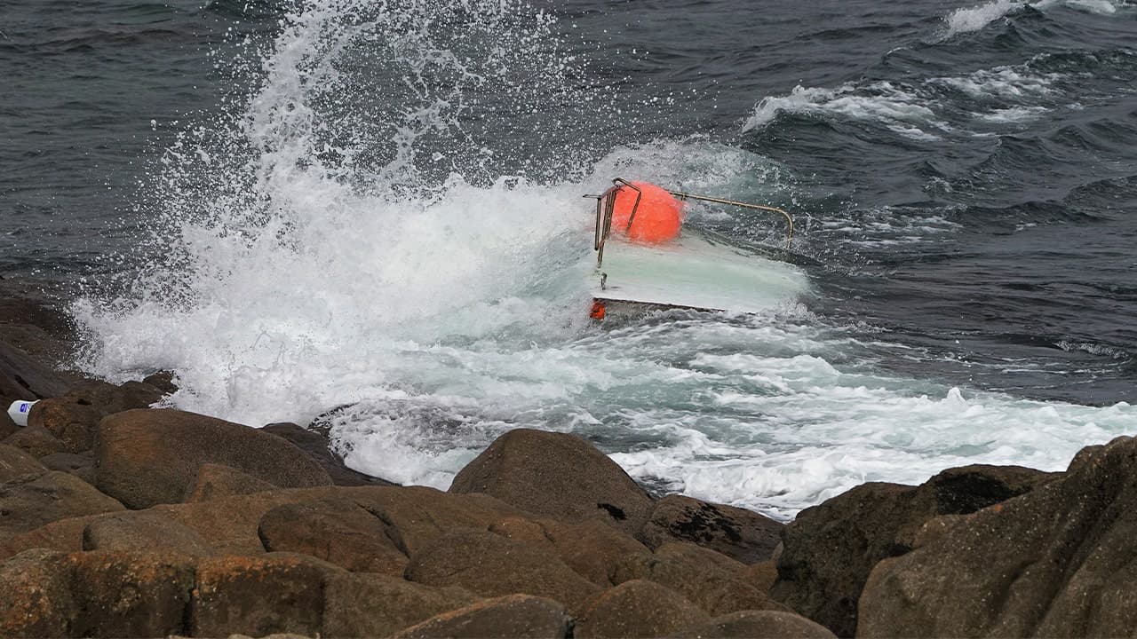 Teen clings to capsized boat after 3 go missing