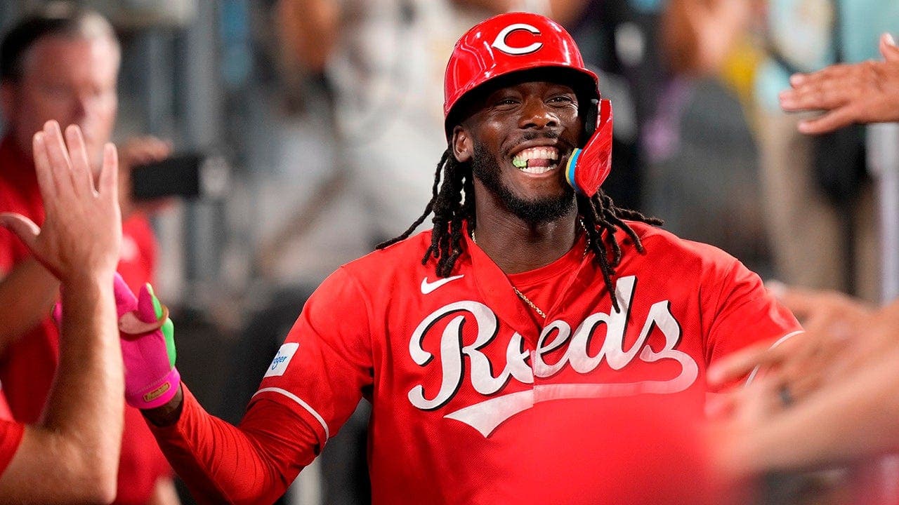 Reds star makes rapid throw to catch runner