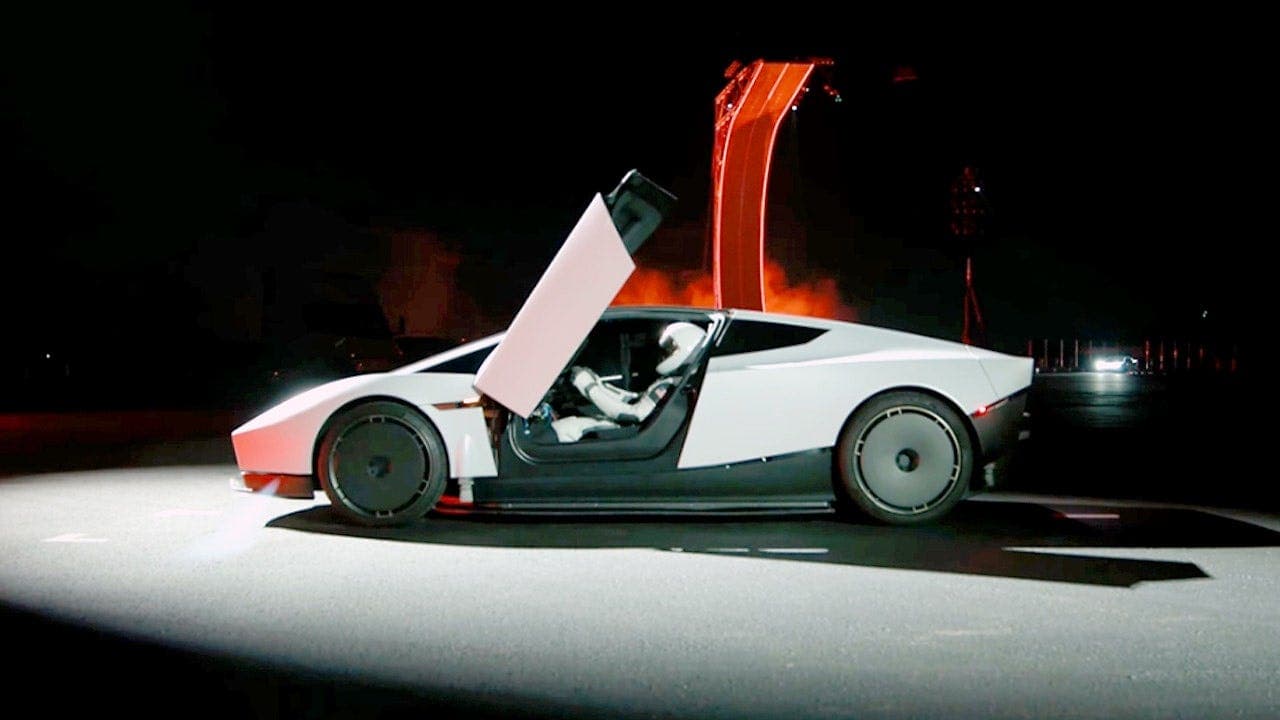 Tesla Roadster speeds and flips