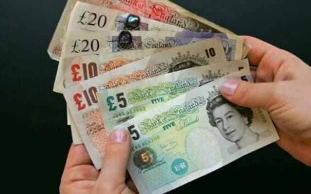Britain issues 30-year bonds at 1998 high