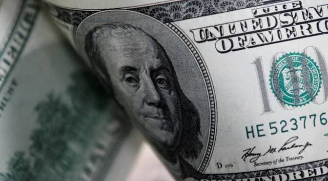 Dollar reaches two-week high amid Fed outlook