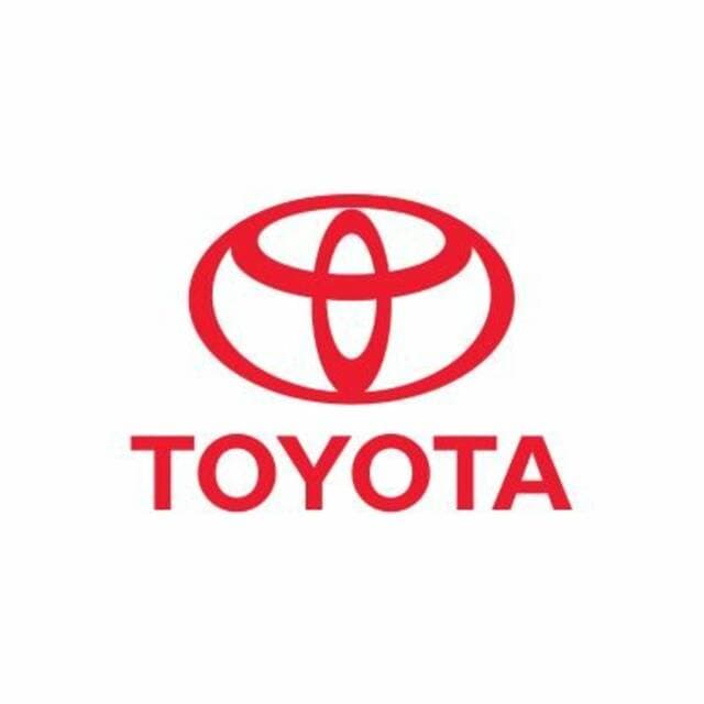 Toyota boosts profit forecast despite sales dip