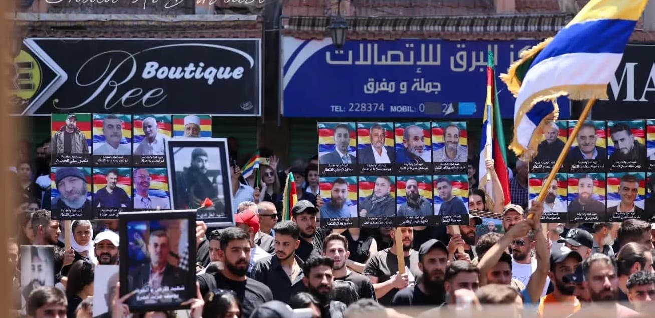 وقفات وإضاءة شموع لإحياء ذكرى مجزرة تموز الأسود في السويداء