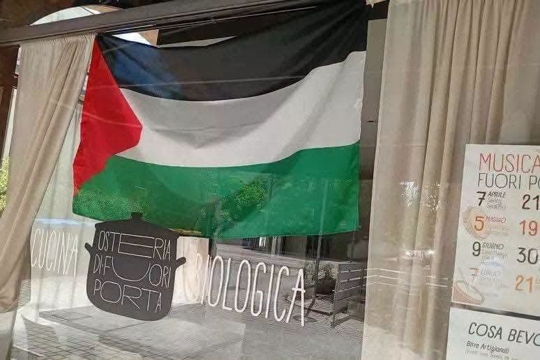 مطعم إيطالي يلغي حجز وفد إسرائيلي لرفع علم فلسطين
