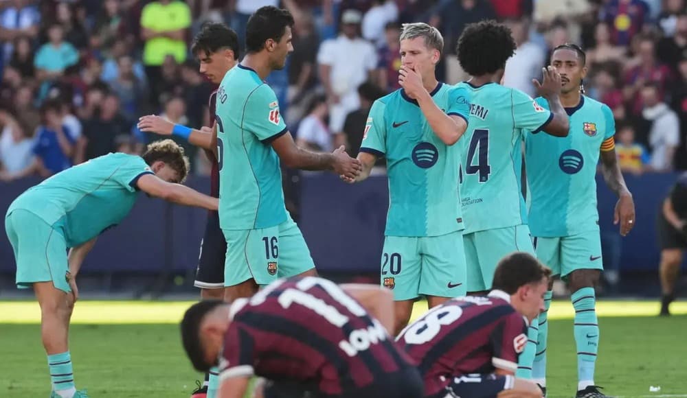 Barcelona stays top after four-goal win